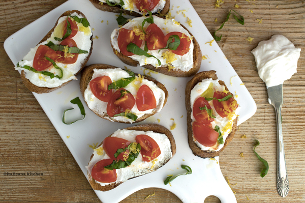 Bruschetta-with-Whipped-Feta,-Tomato,-Basil-and-Lemon-Zest