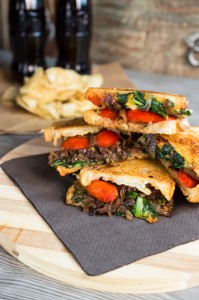 Mouthwatering swiss chard and caramelized balsamic onion grilled cheese sandwich