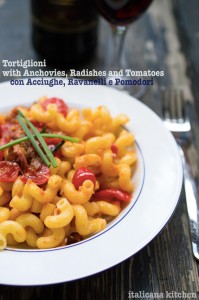 Tortiglioni with anchovies, radishes and tomatoes