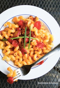 Tortiglioni with anchovies, radishes and tomatoes