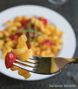 Tortiglioni with anchovies, radishes and tomatoes